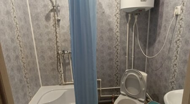 Кровать в общем номере Гостевой дом Ихала