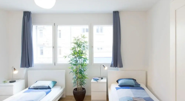 Zh Kreuzplatz I Hitrental Apartment
