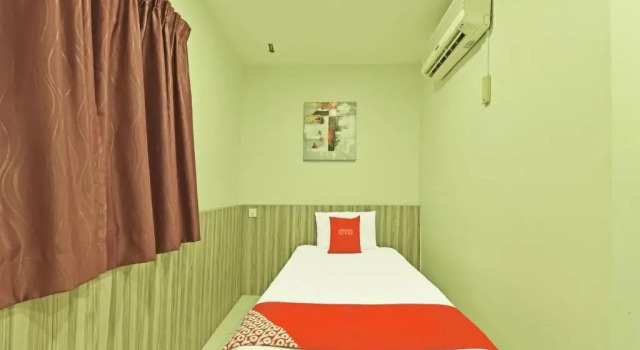 Номер Deluxe Super OYO Capital O 90545 Ho Hotel