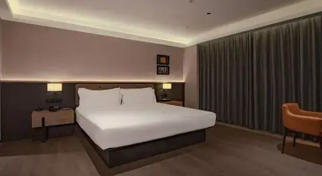Люкс Suihua Jinhui Hotel (Beilin District  Wanda Plaza Branch)