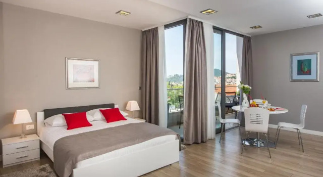 Студия Deluxe с балконом и с видом на город Apartments ZoomZoom