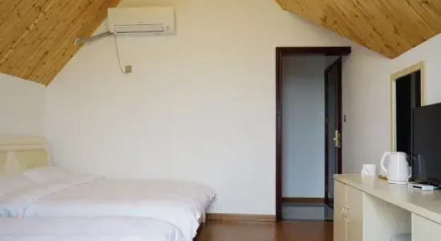 Четырёхместный семейный люкс Shangyi Guesthouse