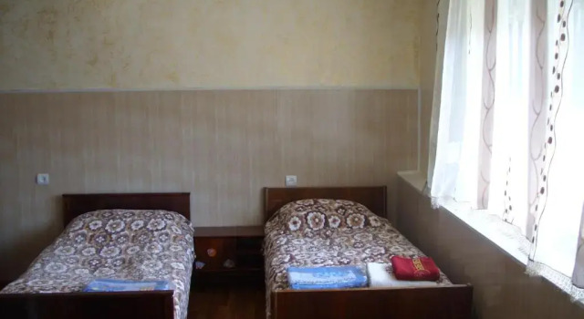 Кровать в общем номере Guest House Garniresthost
