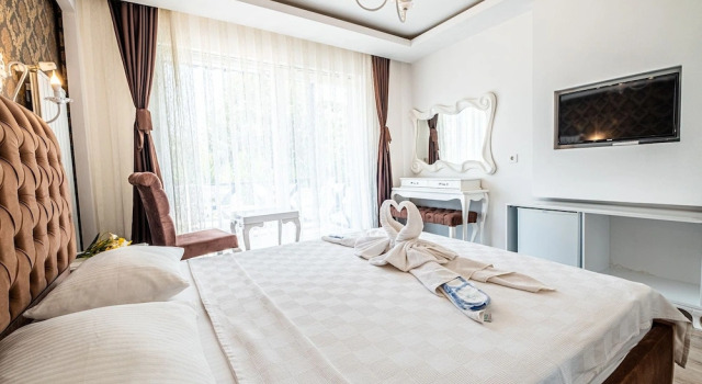 Трёхместный номер Deluxe с балконом Assos Ayan Motel