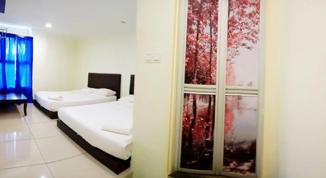 Трёхместный люкс Cattleya Glory Hotel