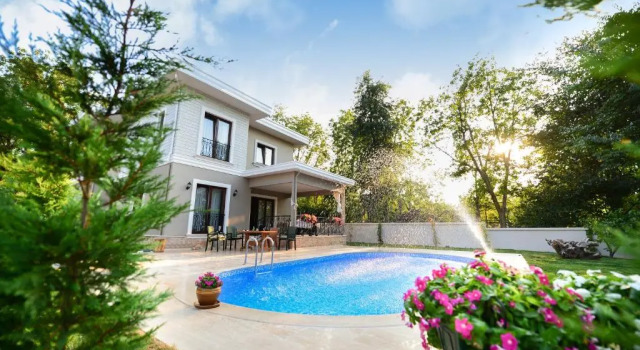 Вилла с 3 комнатами Guzel Evler Family Resort