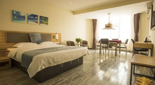 Люкс Deluxe Tuwo Holiday Hotel (Yingshan bus station store)