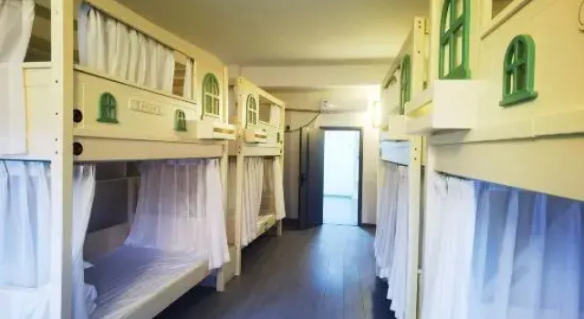 Кровать в общем номере Kashgar Ancient City Munag Hotel