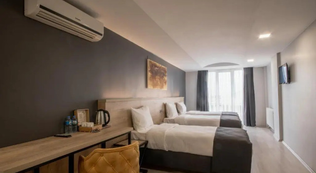 O podwyższonym standardzie czteroosobowy pokój Adresin Hotel