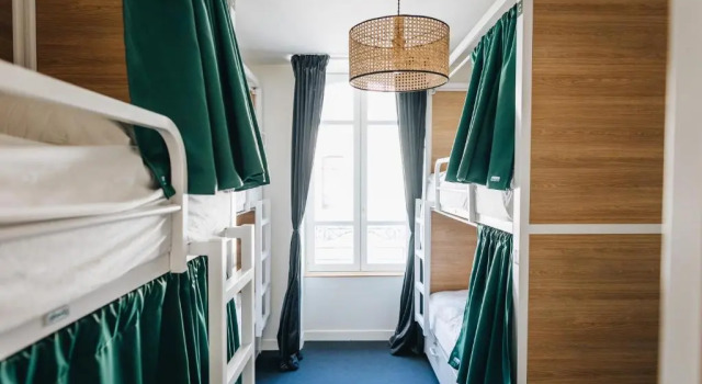 Кровать в общем номере Les Chouettes Hostel