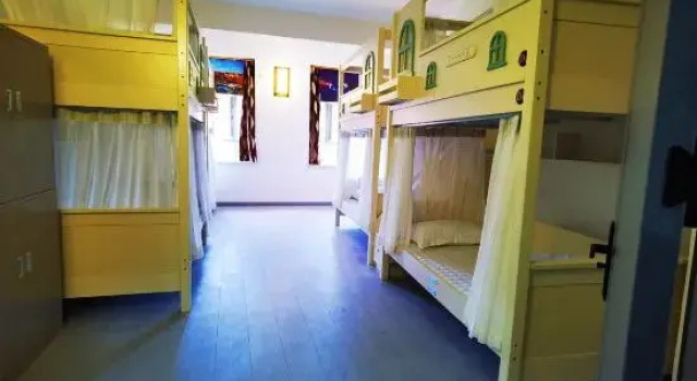 Кровать в общем номере Kashgar Ancient City Munag Hotel