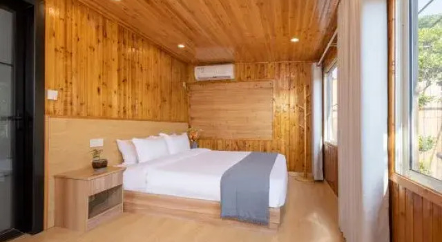Кровать в общем номере Floral Hotel· Yiding cottage Hotel (riverside Dingba store)