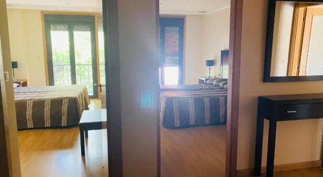 Кровать в общем номере Hotel AV Apartamentos Lobios