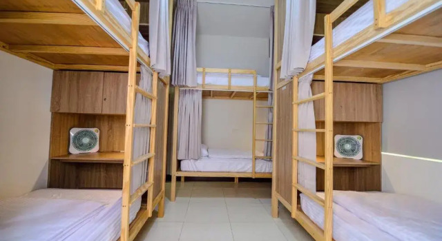 Кровать в общем номере Ta Li Wen B&B