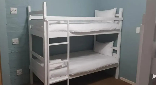 Кровать в общем номере Pili Pili Beach Cabanas