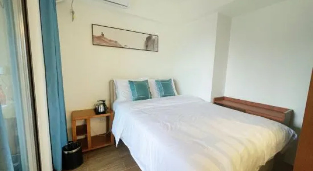 Люкс с 3 комнатами Wolong Vacation Apartment (Wuyishan Sangu Resort Area)