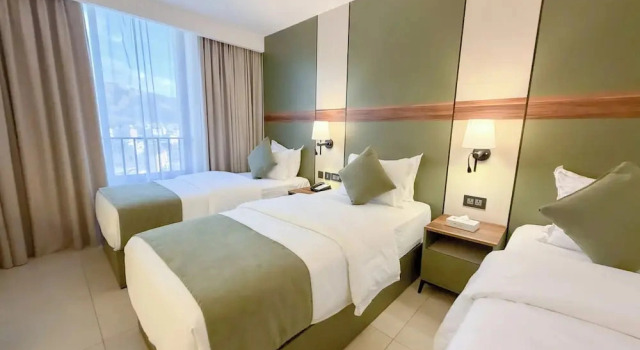 Standard Vierer Familie Zimmer mit eingeschränktem Meerblick Coral Beach Hotel & Spa