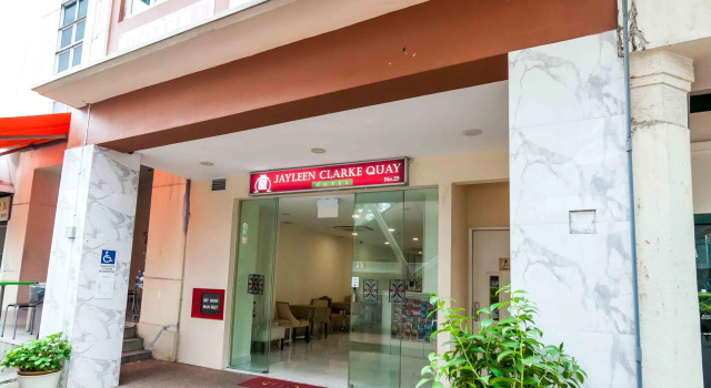 Кровать в общем номере Jayleen Clarke Quay Hotel