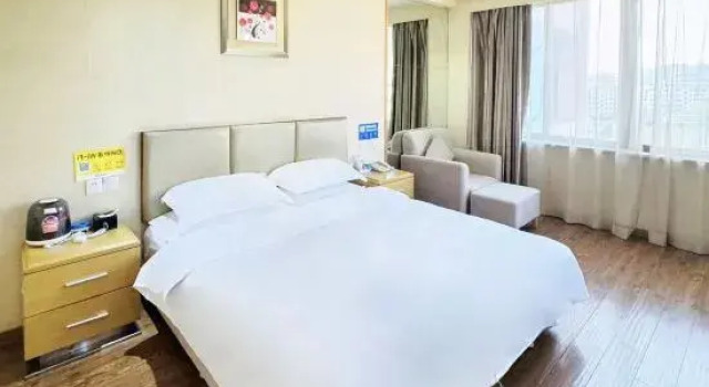 Люкс Deluxe Taizhou Songgu Yunshang Hotel (Huangyan District Government Wuyue Plaza)