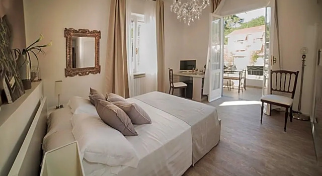 aMarti Suites B&B, Забронировать Отель Отели и гостиницы Санто-Стефано-ди-Магра, Отель