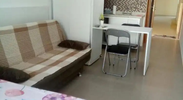 Четырёхместный номер Standard с балконом Manawa Beach Flats Prime