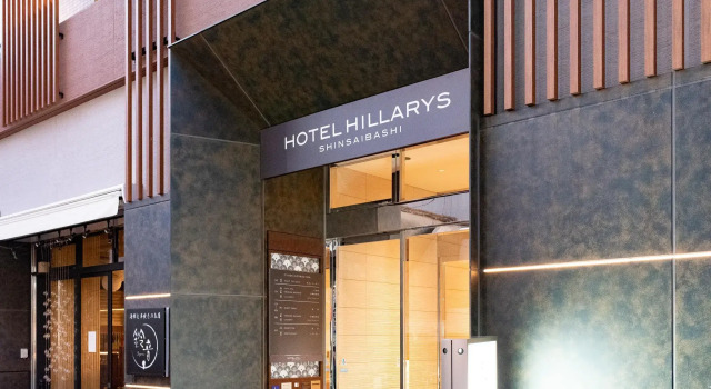 Кровать в общем номере HOTEL HILLARYS Shinsaibashi