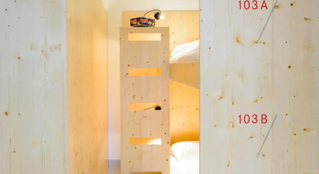 Кровать в общем номере The Green Elephant Hostel & Spa