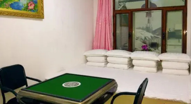 Кровать в общем номере Rime Island Manzhaosongju Inn