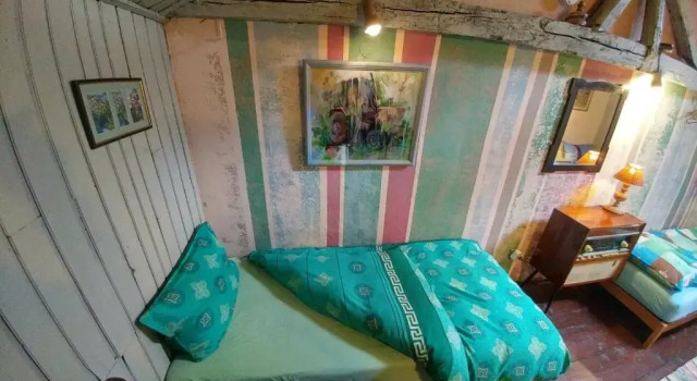 Кровать в общем номере Rooster Hostel