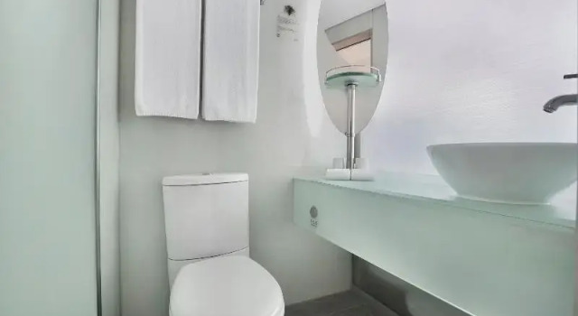 O podwyższonym standardzie trzyosobowy pokój Rambler Oasis Hotel