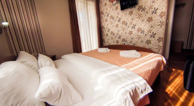 Familie suite cu balcon Orange Inn Hotel