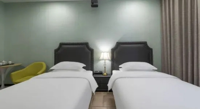 Семейный люкс Cixi SANBI Huayuan Hotel (School of science and technology, Ningbo University)