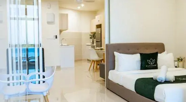 Люкс Deluxe c 1 комнатой с видом на море The Shore Premier Suites Kota Kinabalu