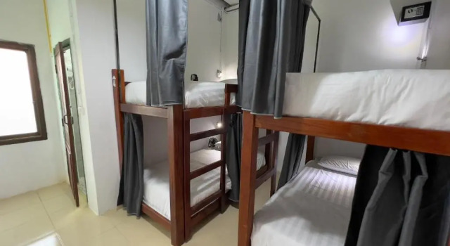 Кровать в общем номере Vang Vieng Chill House
