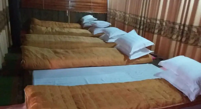 Кровать в общем номере Yen Nhi Homestay Ban Gioc - CS2 Hostel