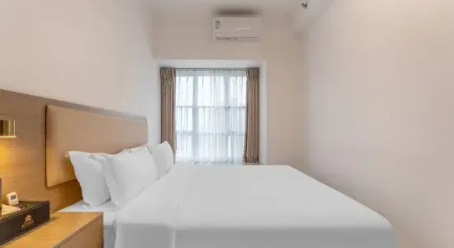 Двухместный люкс Shuoke International Apartment