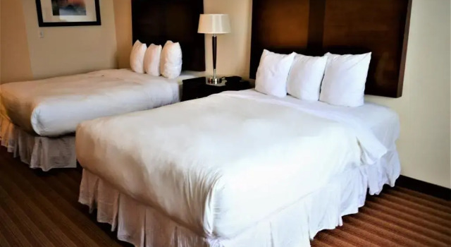 Четырёхместный номер Standard Sigma Inn & Suites Hudsons Hope