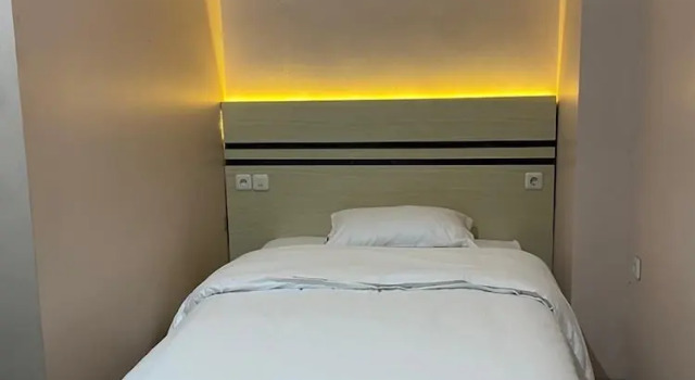 Номер Economy Karana Guesthouse Syariah Bandung & Luang Cafe