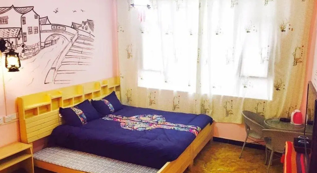 Shinian Youth Hostel, Prenota Ostello Hotel a Lijiang con parcheggio, Parcheggio