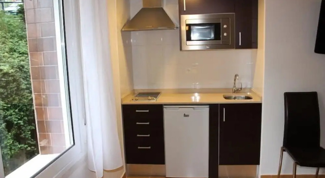 Апартаменты Hostal Rocamar