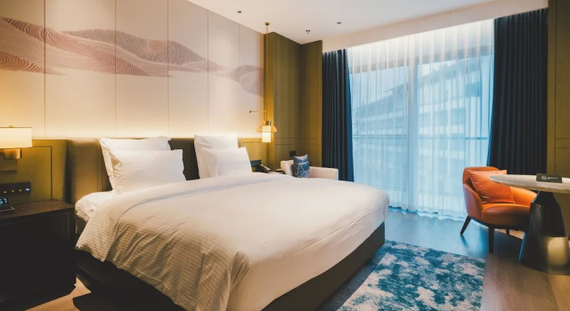 Двухместный номер Deluxe с балконом и с видом на сад Pullman Taizhou Shenxianju