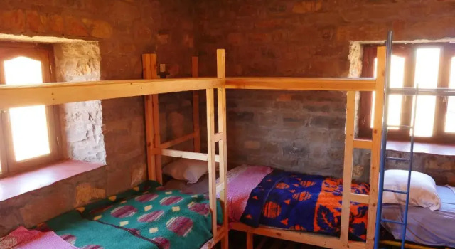 Кровать в общем номере Auberge Hostel Traditionnel