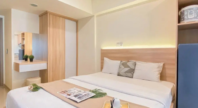 Warm Minimalist Studio Apartment Near Paramadina University At Meikarta