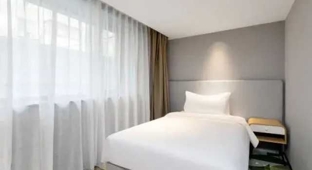 Люкс Country Inn & Suites by Radisson Hotel (Mudanjiang Station East Pedestrian Street)
