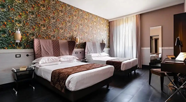 Четырёхместный номер Executive Unica Suites Rome