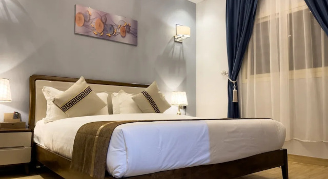 Номер Deluxe معلم المدينة للشقق الفندقية City Landmark Hotel Suites