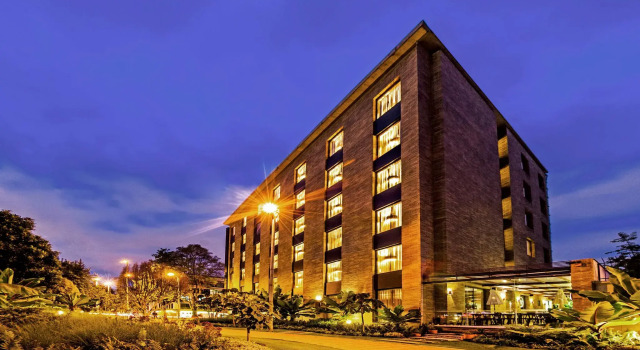 Кровать в общем номере Мансарда Hotel Morrison Usaquén