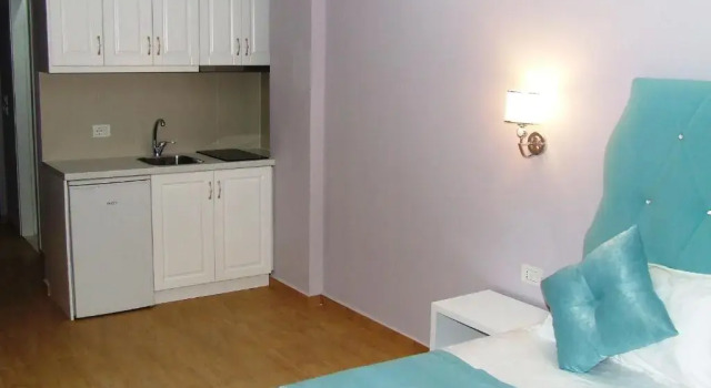 Трёхместный номер Deluxe с балконом Apartments Flower Residence