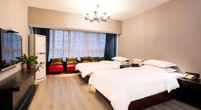 Семейный люкс Deluxe Maigode Hotel (Henan People's Hall Yanzhuang Metro Station)