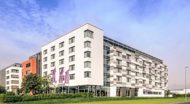 Кровать в общем номере Mercure Hotel Frankfurt Eschborn Helfmann-Park